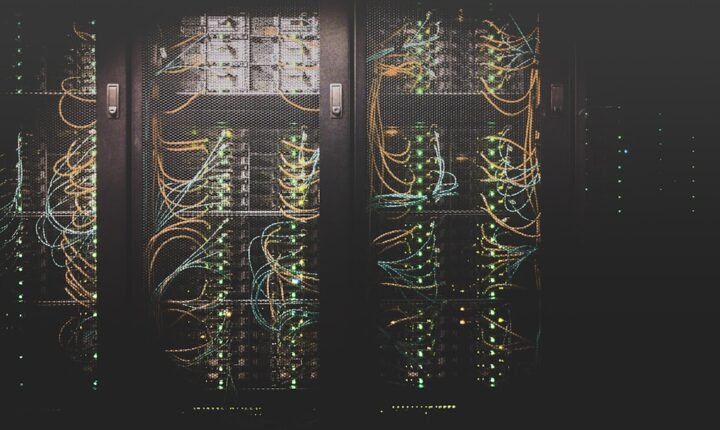 Network cables and server infrastructure inside a data centre, illustrating AI infrastructure financing