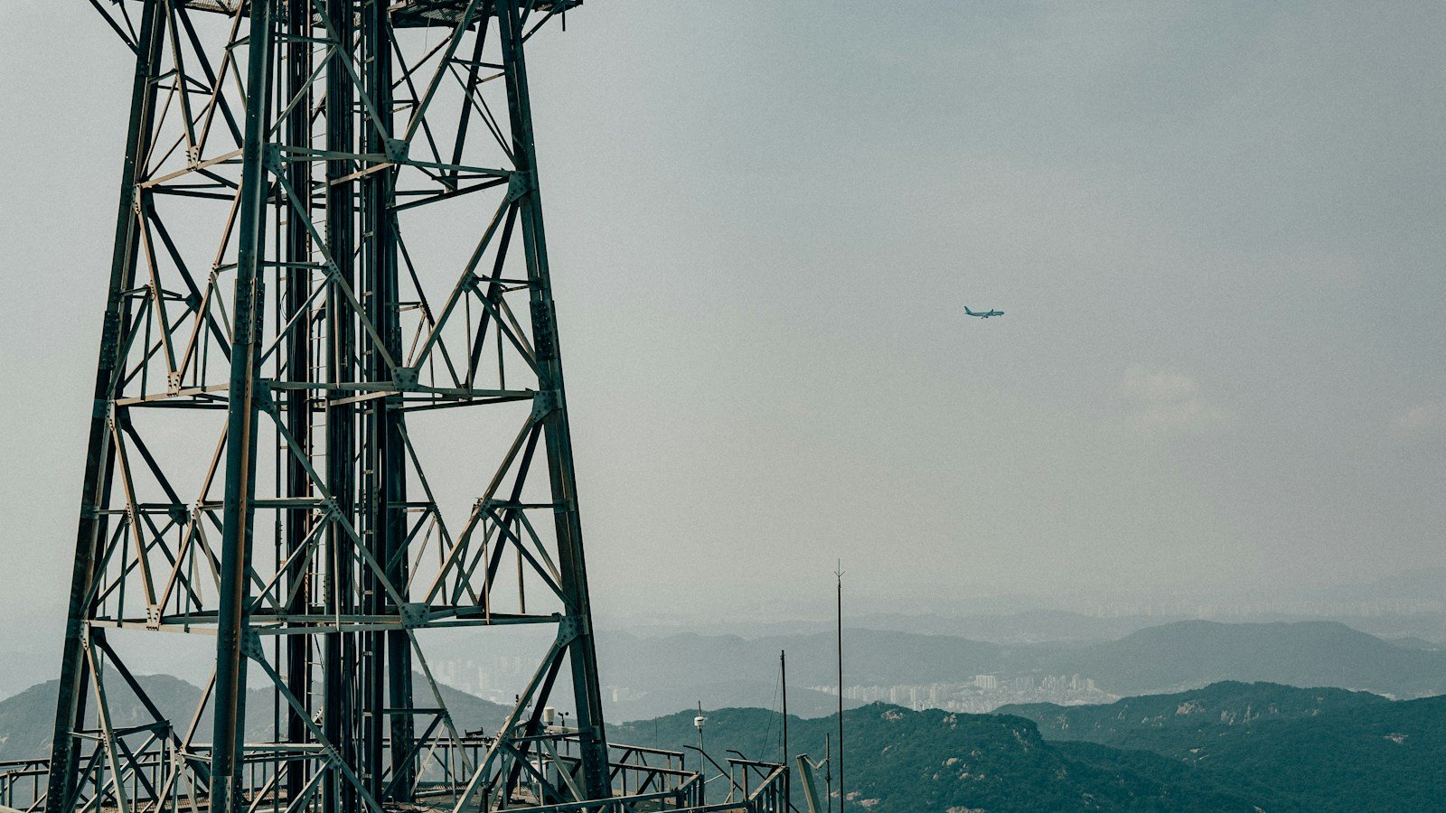 Electricity transmission tower illustrating the Asia electrification target for 2035