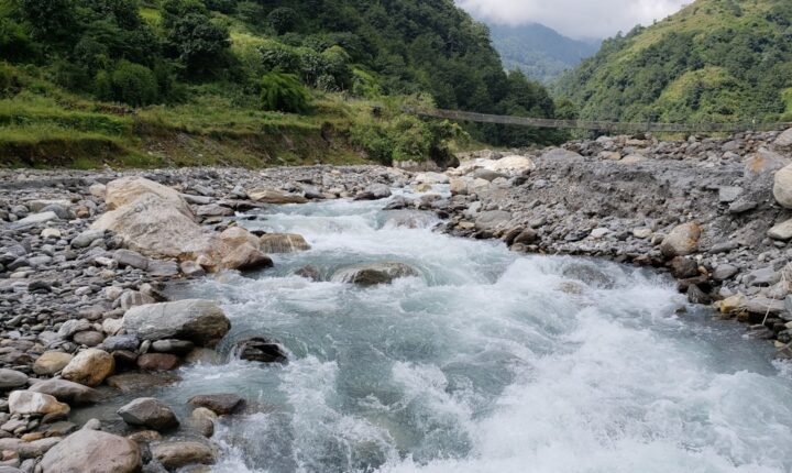 Nepal tunnel rescue context: a rocky Himalayan river in a steep mountain valley