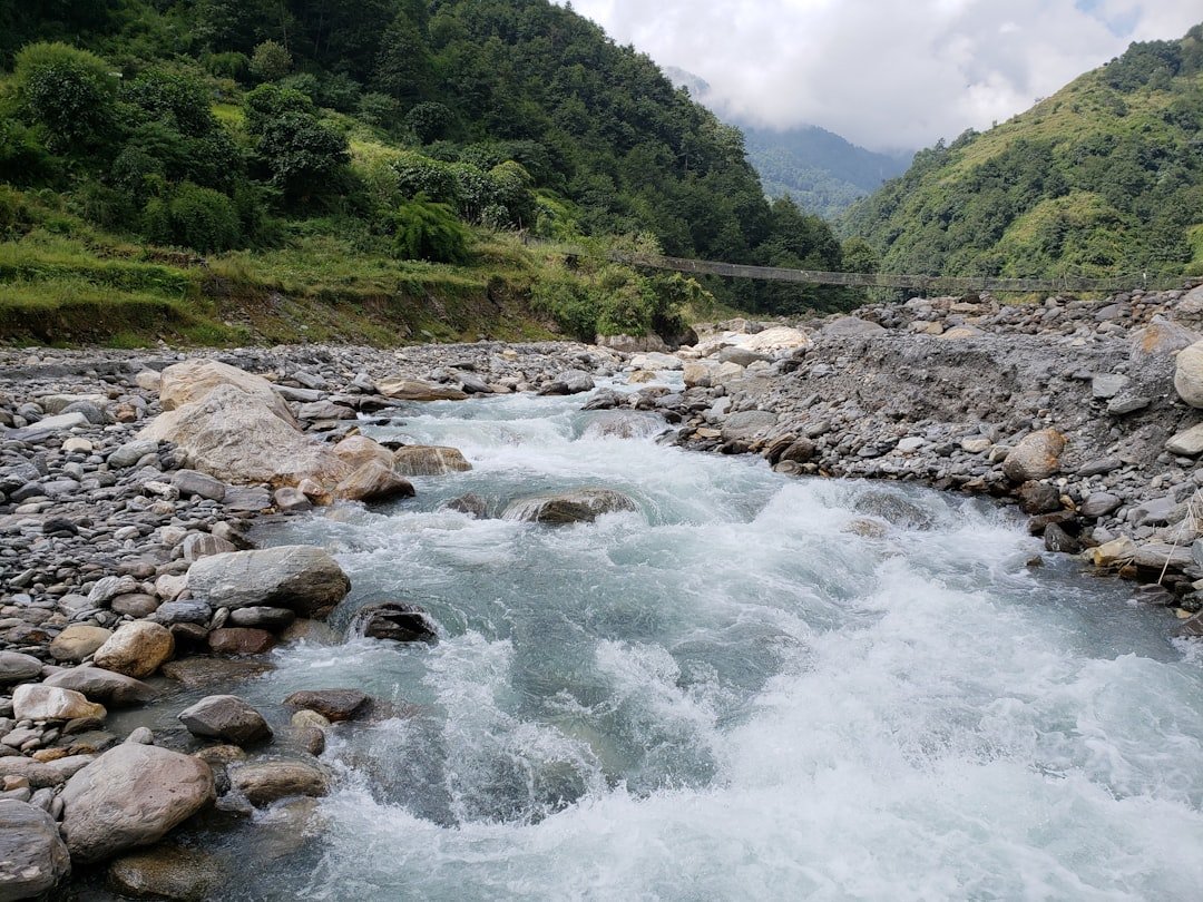 Nepal tunnel rescue context: a rocky Himalayan river in a steep mountain valley