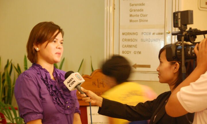 Sara Duterte speaking to a television news crew in March 2009
