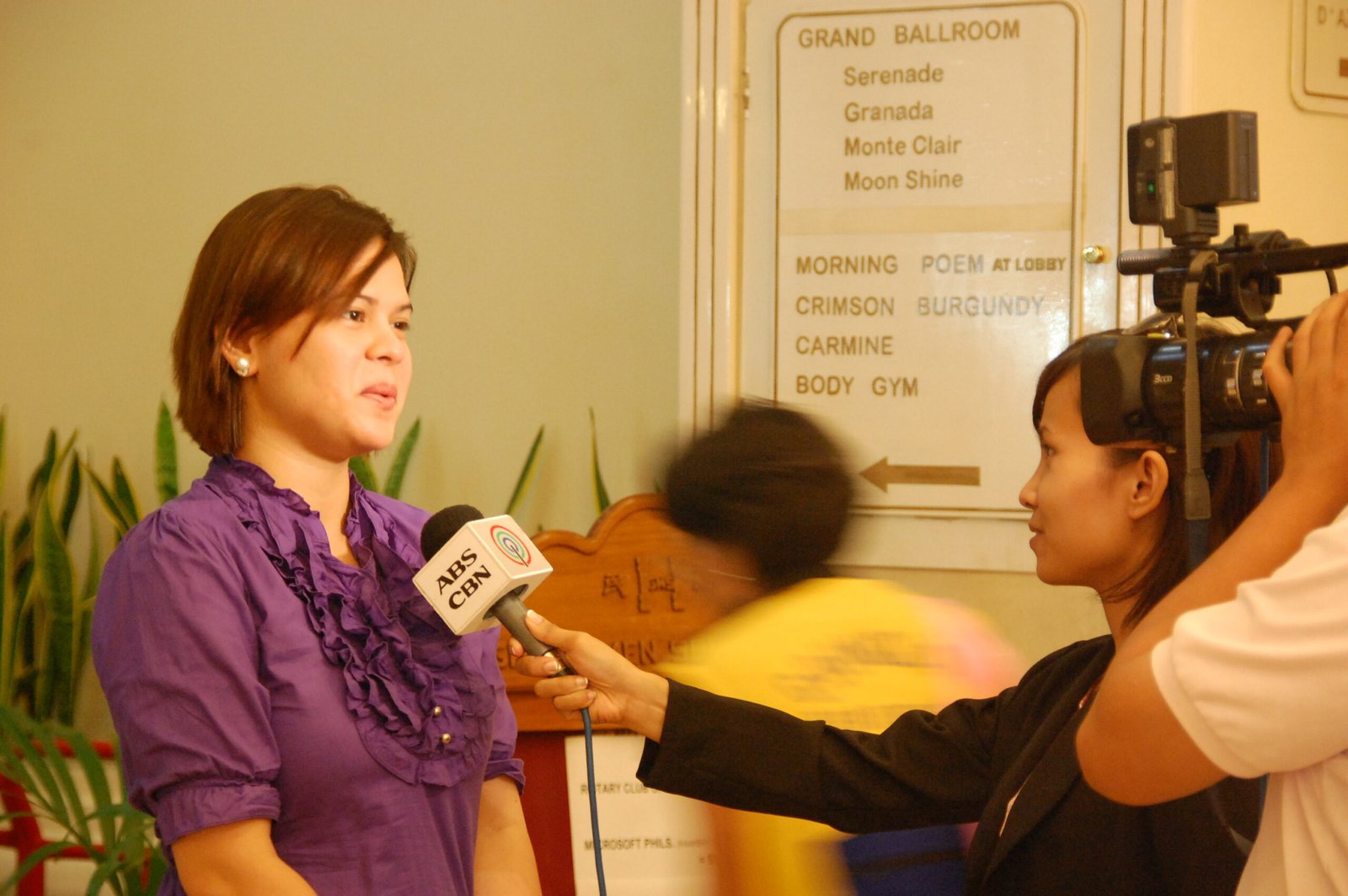 Sara Duterte speaking to a television news crew in March 2009