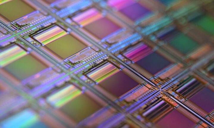 Close-up of a silicon wafer containing rows of semiconductor chips