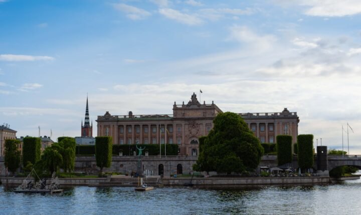 Swedish Parliament Riksdag building beside the water in Stockholm