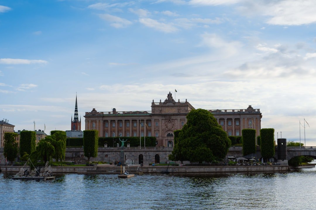 Swedish Parliament Riksdag building beside the water in Stockholm