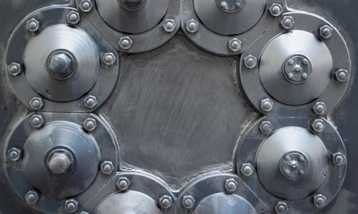 Uranium centrifuge cascades explained with illustrative industrial machinery
