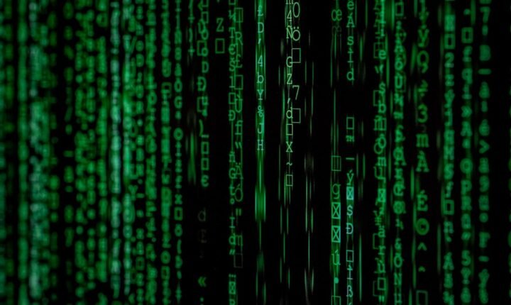 Computer code displayed on a screen, illustrating AI cybersecurity and safety