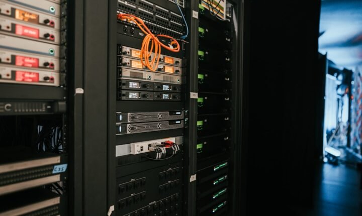 Rows of server racks in a data centre, illustrating AI infrastructure