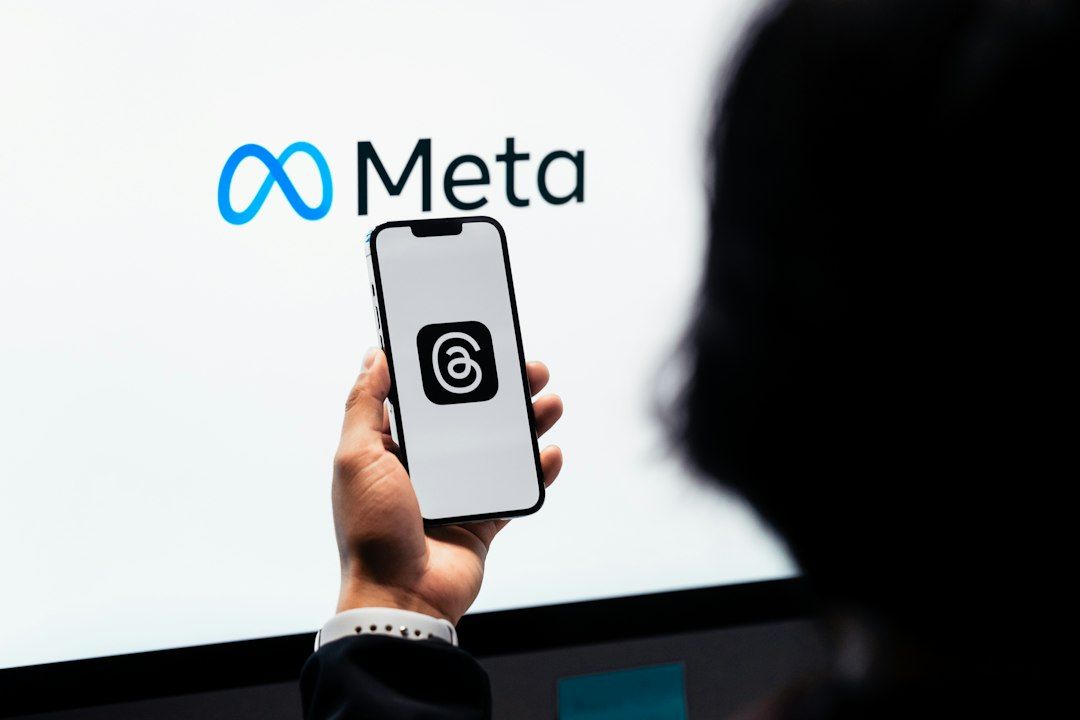 Person using the Meta Threads app on a smartphone