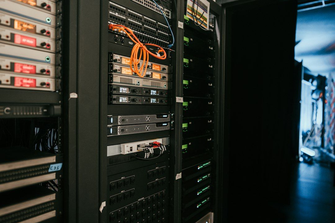 Rows of server racks in a data center, illustrating the computing infrastructure used to train and run large AI models.
