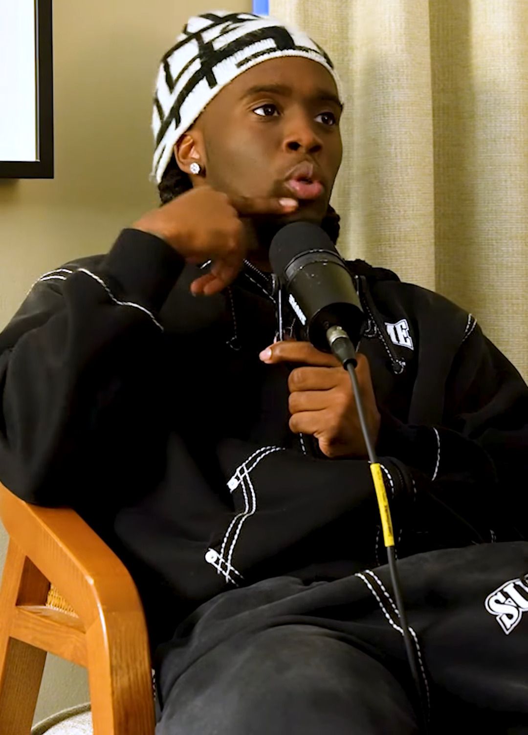 Kai Cenat during a December 15, 2023 interview with MILLION DOLLAZ WORTH OF GAME