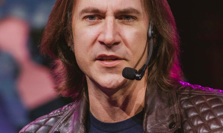 Matthew Mercer speaking into a microphone at IGN Live on 7 June 2024