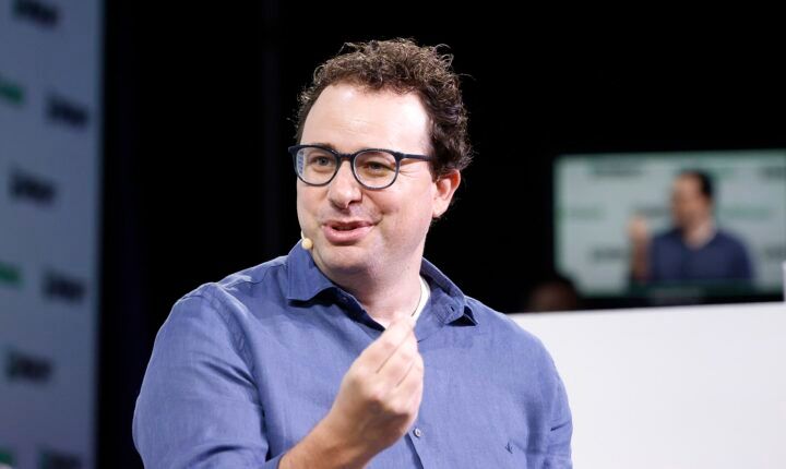 Anthropic IPO: CEO Dario Amodei speaking on stage at TechCrunch Disrupt 2023