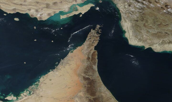 Satellite view of the Strait of Hormuz, the chokepoint behind slowing Hormuz shipping