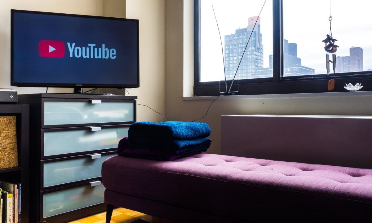 A television showing the YouTube logo in a New York living room