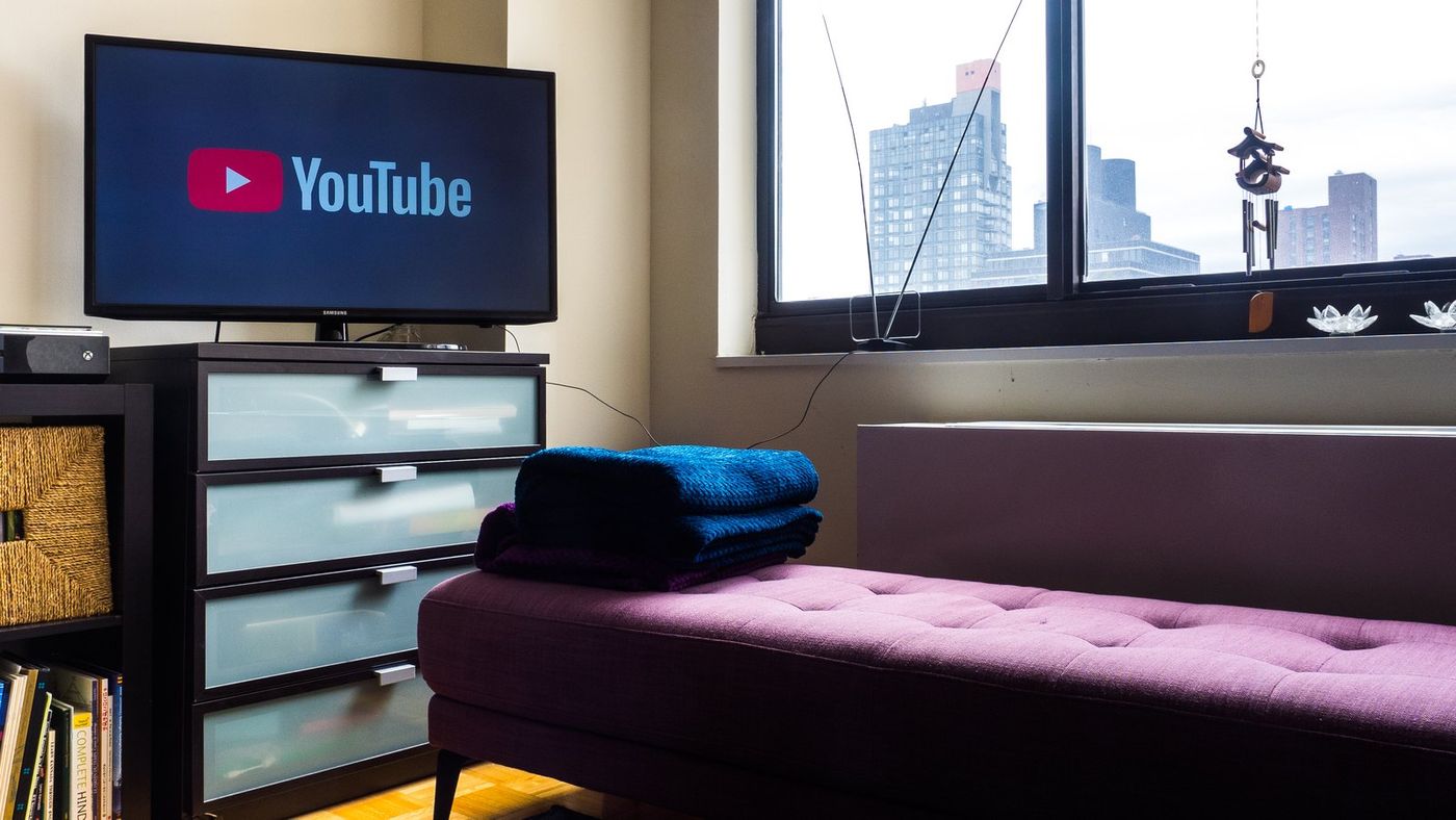 A television showing the YouTube logo in a New York living room