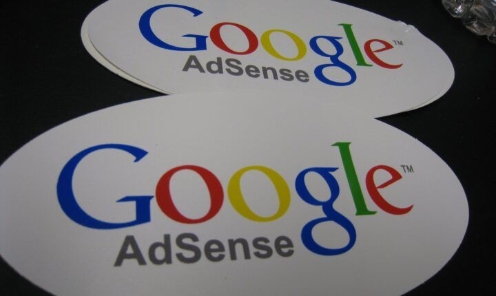 Google AdSense logo stickers; AdSense for YouTube handles the YouTube payment threshold