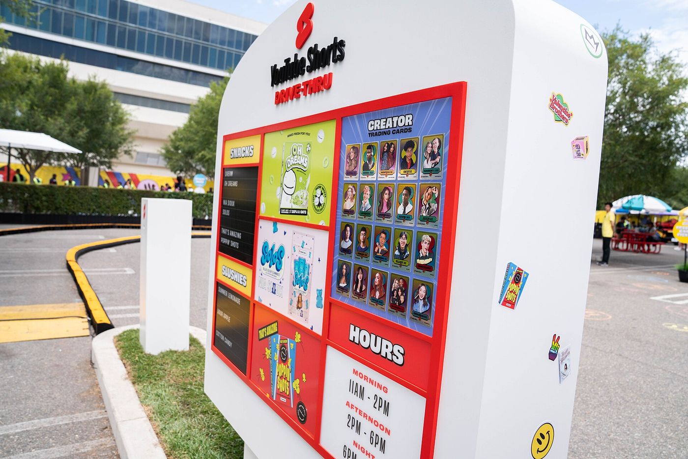 YouTube Shorts Drive-Thru sign with creator trading cards at VidCon 2022 in Anaheim